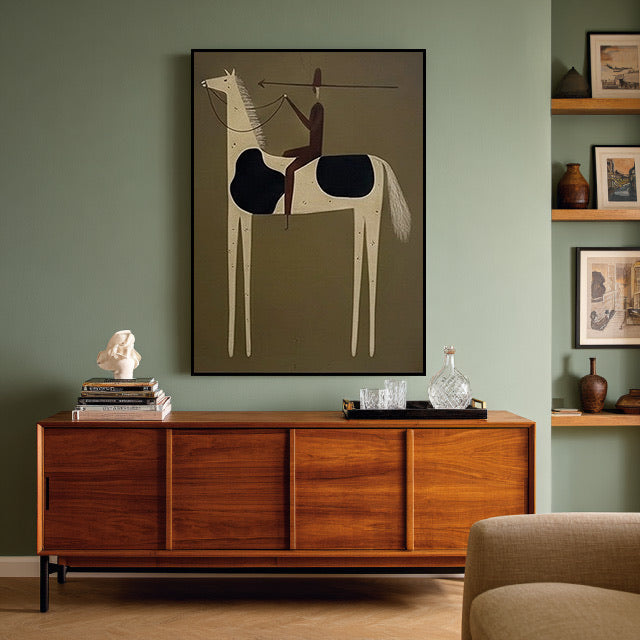 Minimalist Western horse rider wall art in an olive green living room