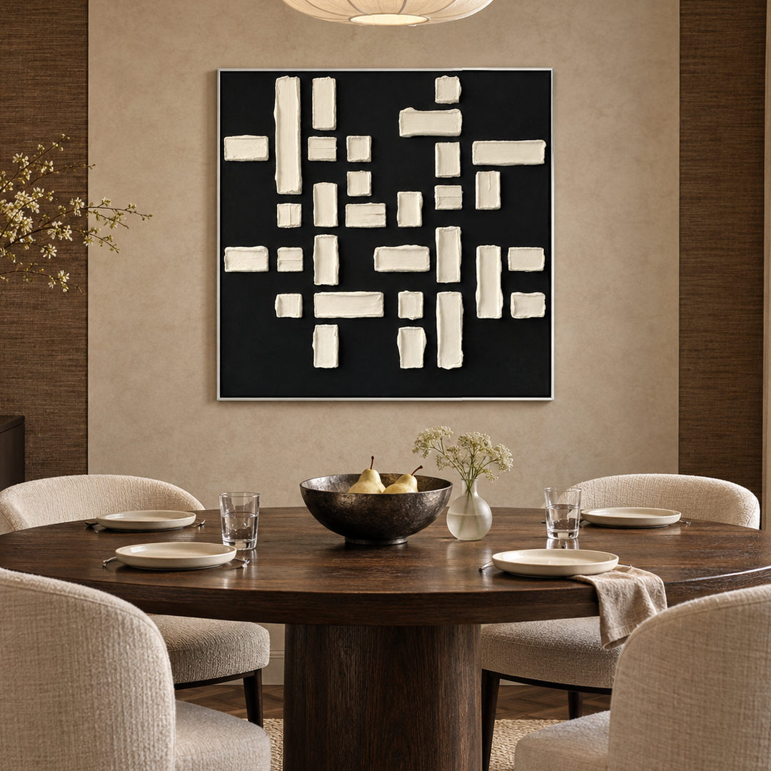 black and white geometric textured wall art with raised blocks in a coordinated modern interior