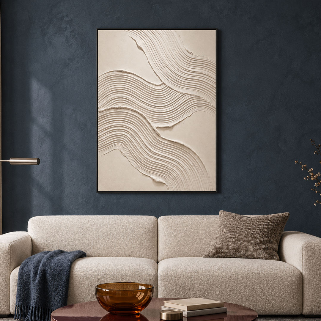 white sculptural textured wall art with flowing contour lines on beige displayed in a styled living room