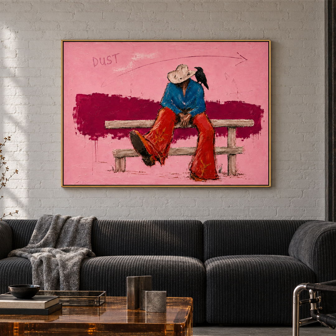 expressive Western cowboy and crow wall art in pink blue and red displayed in a styled living room