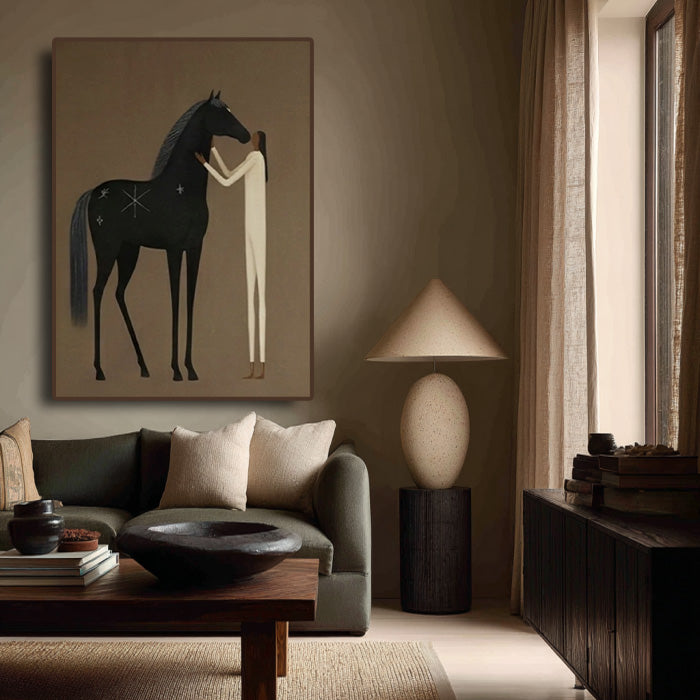 minimalist black horse and figure wall art in a coordinated modern interior