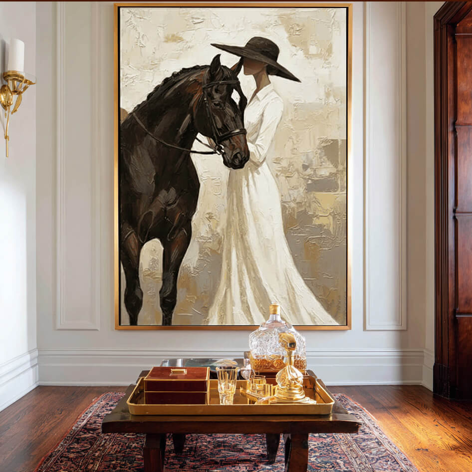 neutral cowgirl and black horse wall art in cream and white in a coordinated modern interior