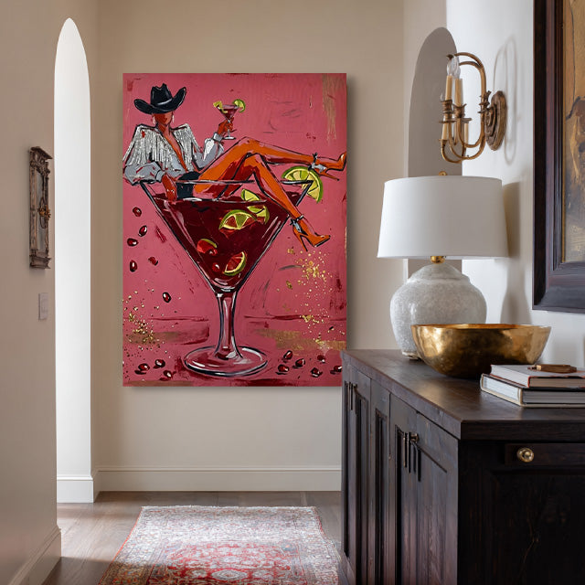 pop Western cowgirl cocktail wall art in pink red and orange in a coordinated modern interior