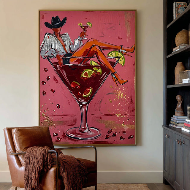 pop Western cowgirl cocktail wall art in pink red and orange displayed in a styled living room