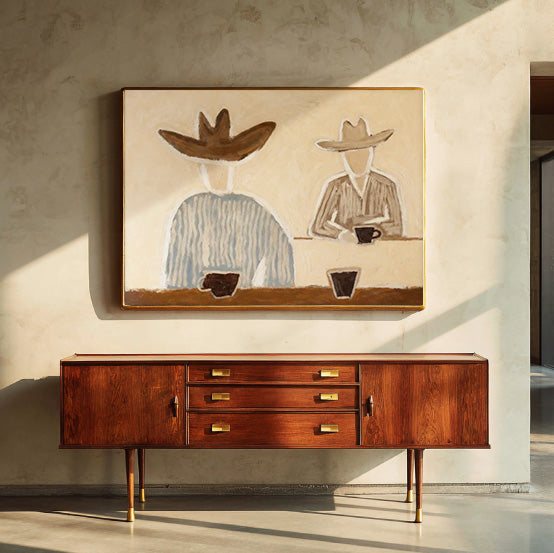 folk Western cowboy wall art in a coordinated modern interior
