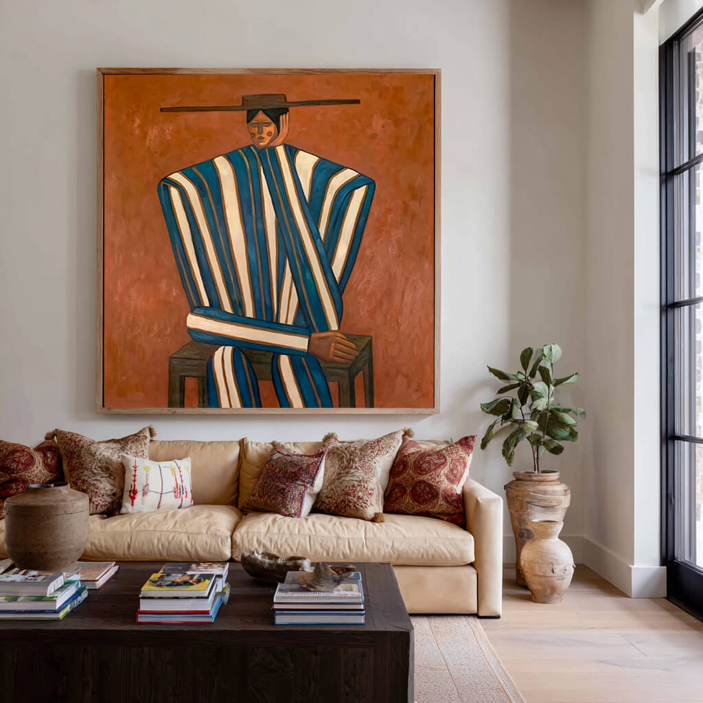 folk Western figurative wall art in blue white and burnt orange in a coordinated modern interior