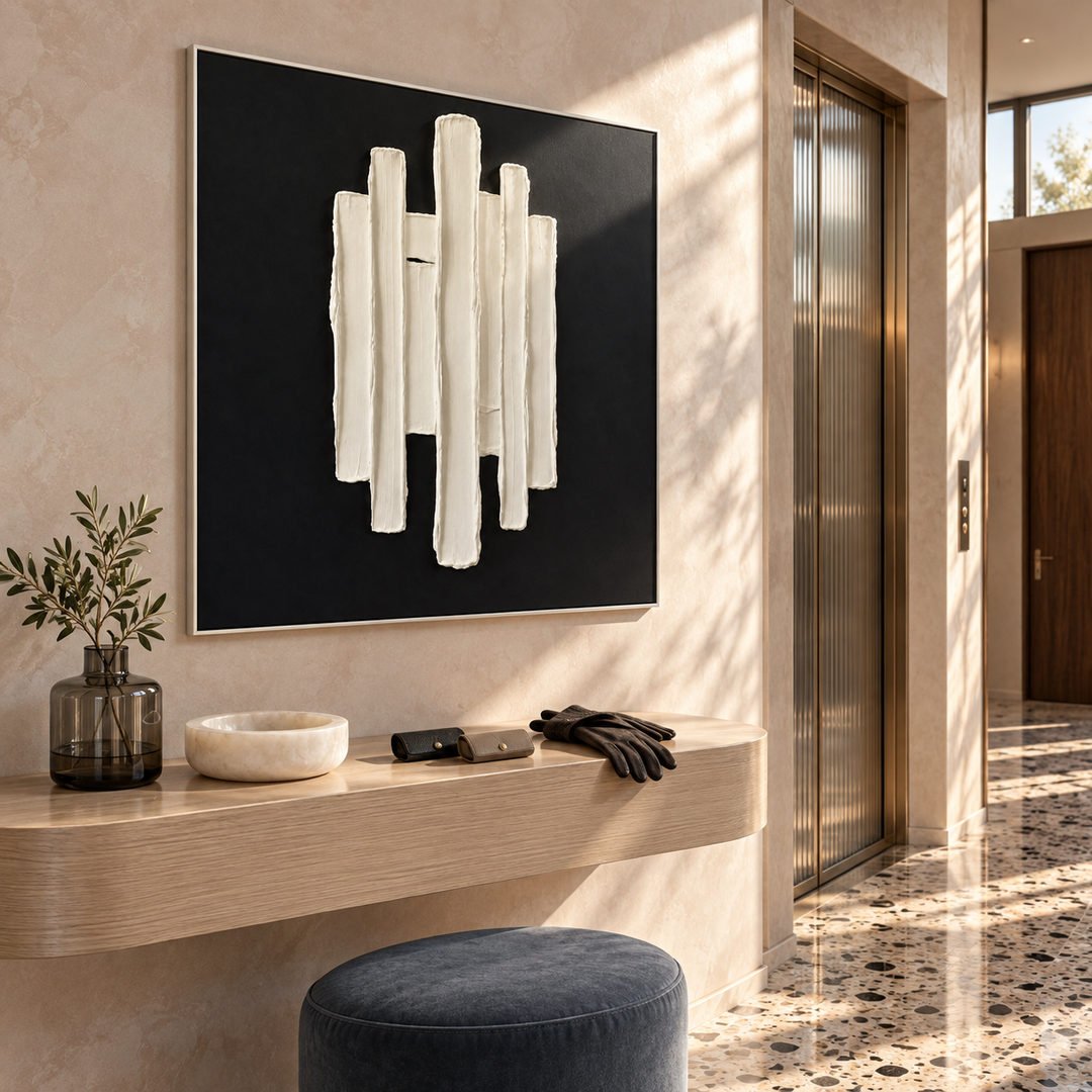 black and white sculptural wall art with vertical raised pillars in a coordinated modern interior