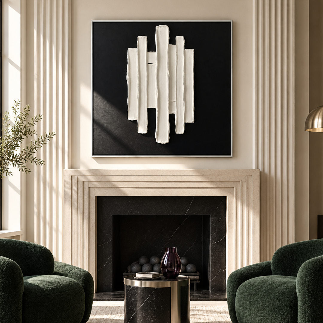 black and white sculptural wall art with vertical raised pillars in a coordinated modern interior