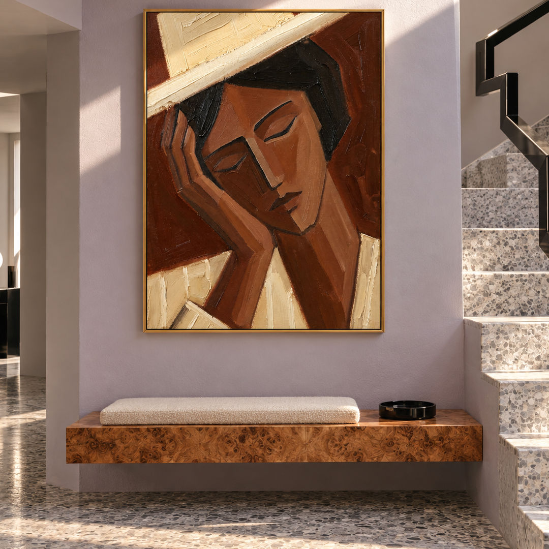 Cubist woman portrait wall art in sienna brown cream and beige displayed in a styled living room