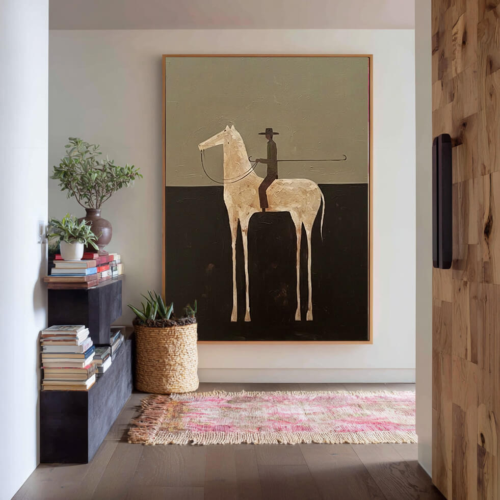 minimalist white horse rider wall art in olive and dark brown displayed in a styled living room