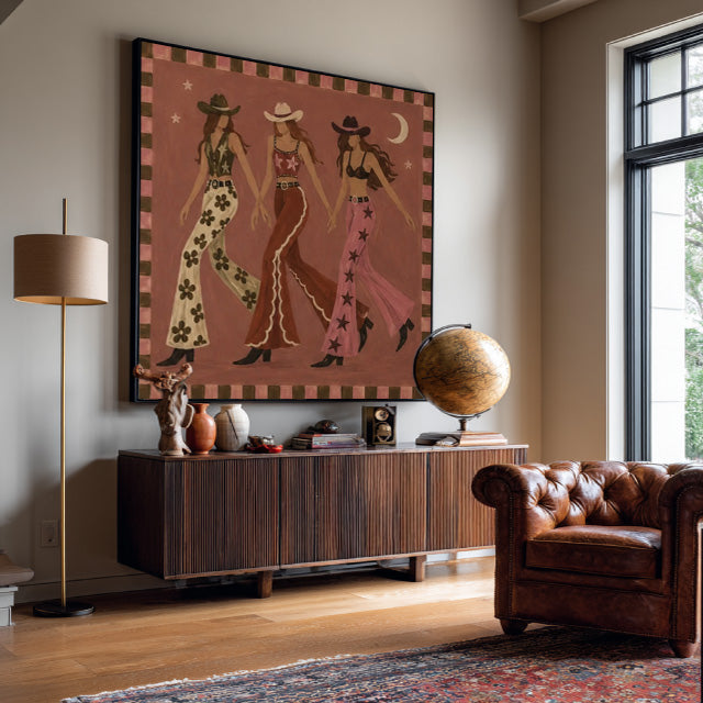 folk Western cowgirl wall art in a coordinated modern interior