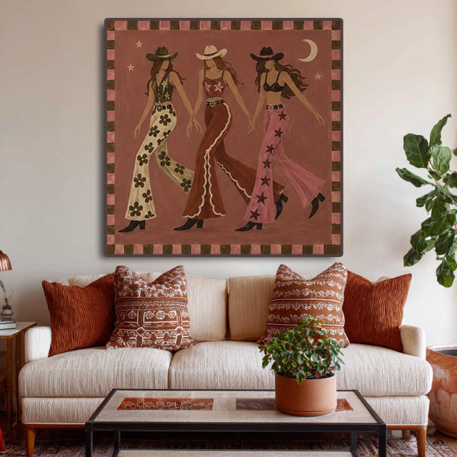 folk Western cowgirl wall art displayed in a styled living room