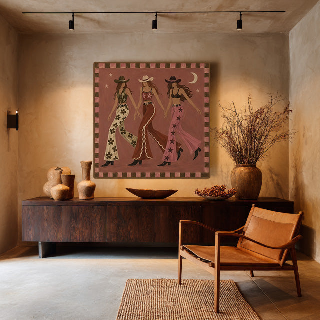folk Western cowgirl wall art in a coordinated modern interior