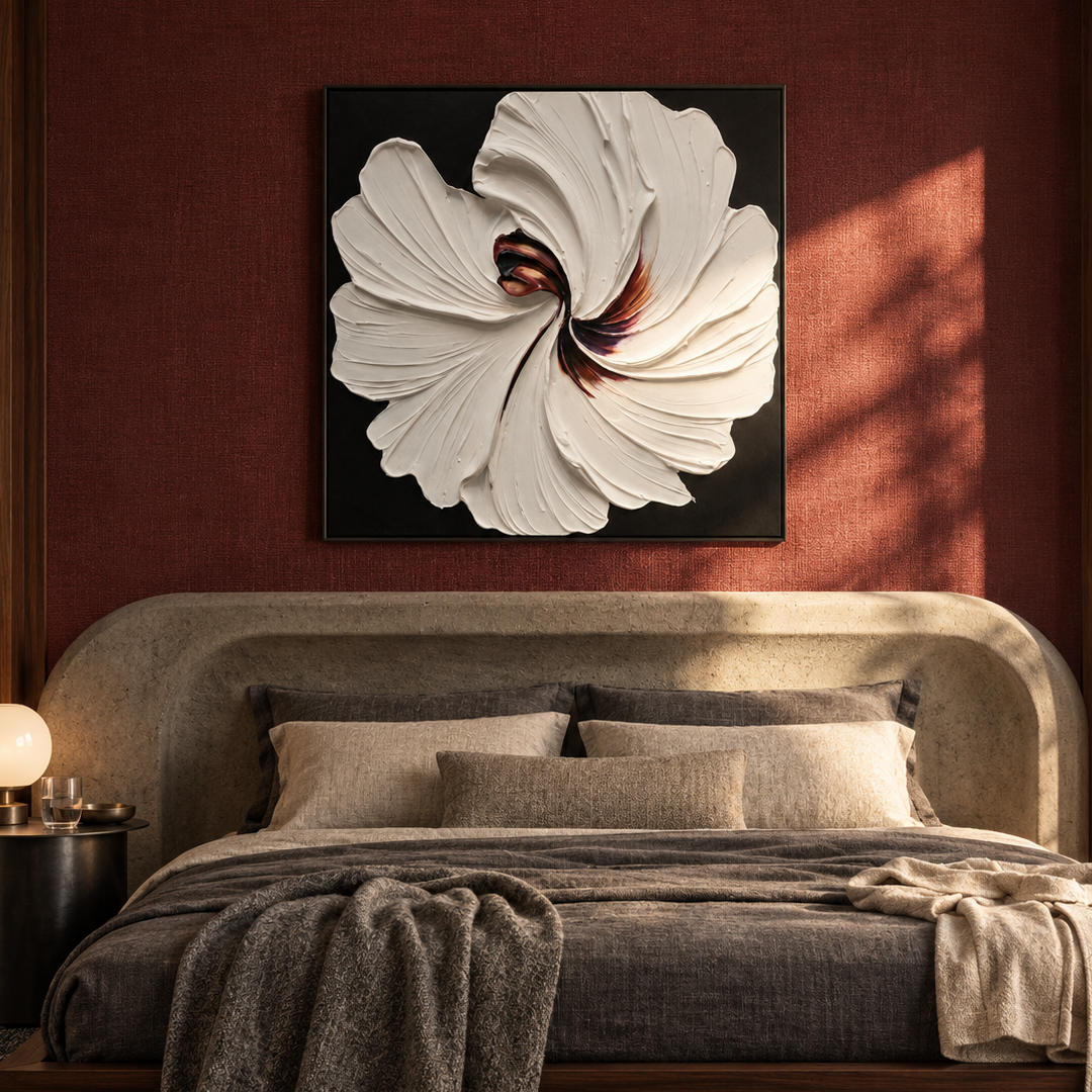 3D textured white floral wall art on black with sculptural petals in a coordinated modern interior