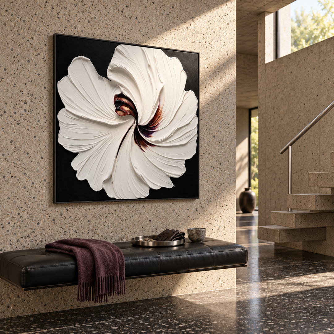 3D textured white floral wall art on black with sculptural petals in a coordinated modern interior
