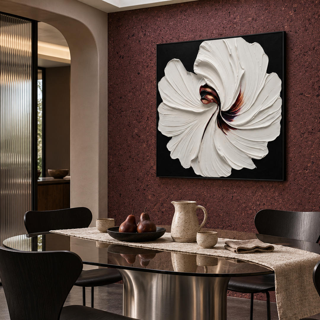 3D textured white floral wall art on black with sculptural petals in a coordinated modern interior