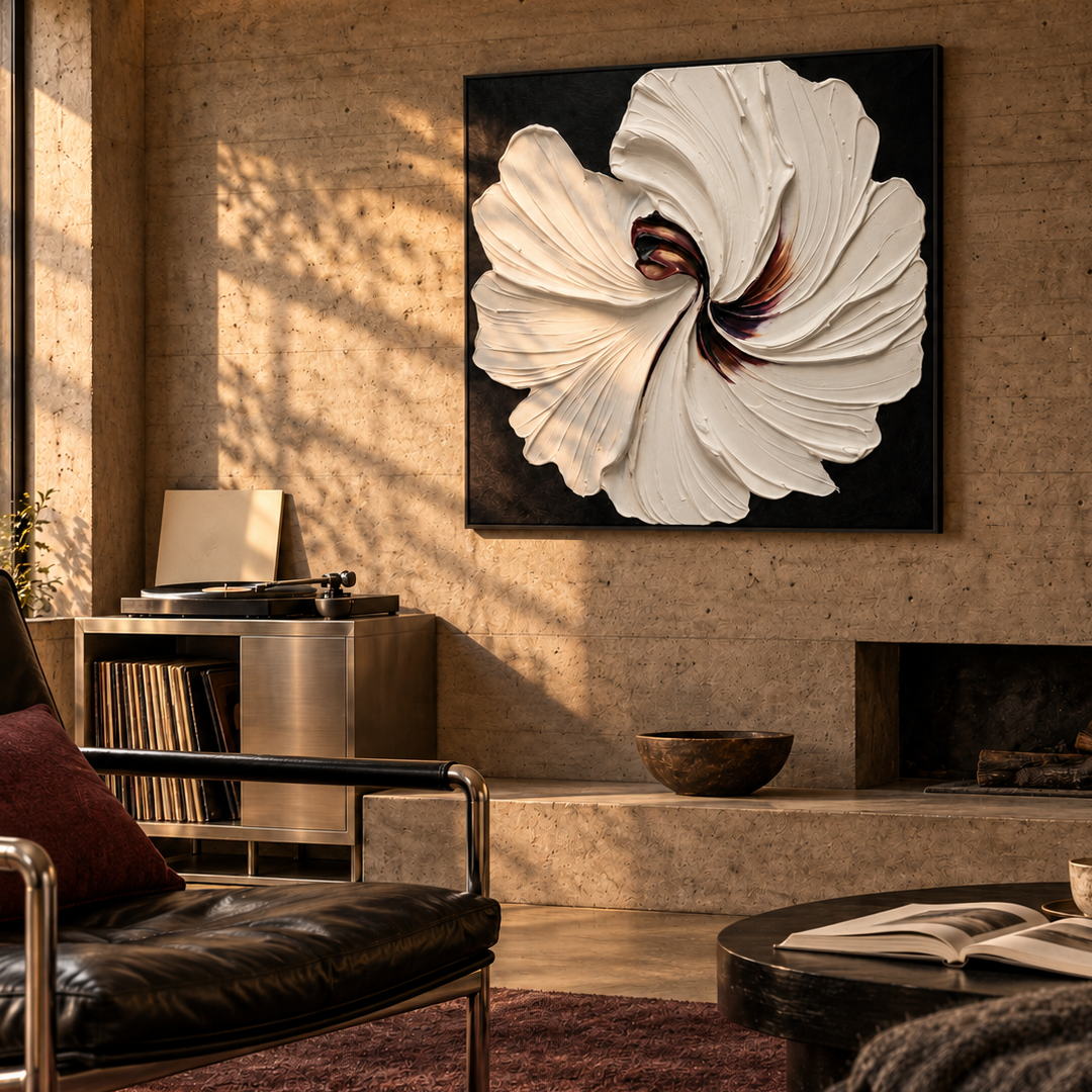 3D textured white floral wall art on black with sculptural petals in a coordinated modern interior