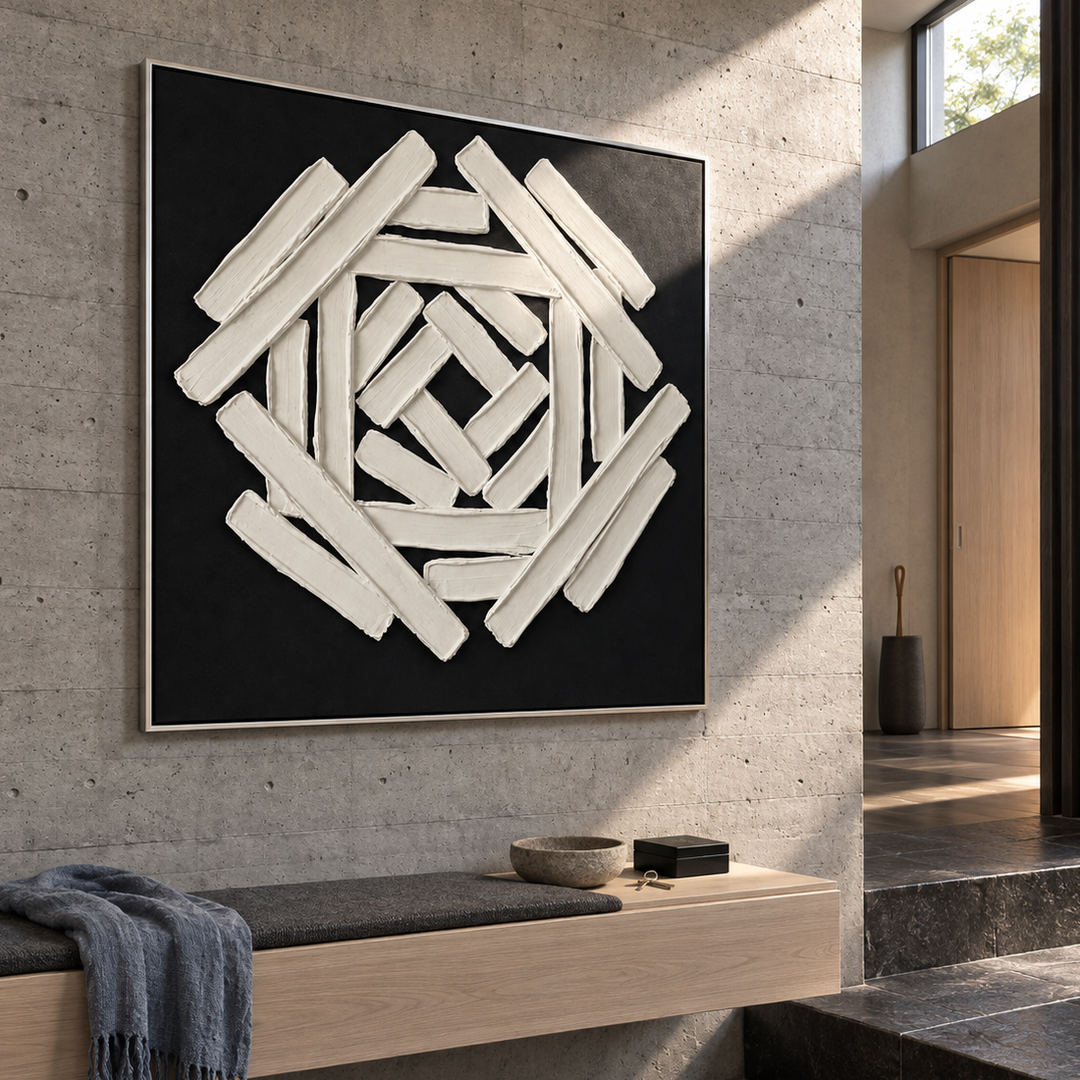 black and white sculptural wall art with interlocking geometric bars in a coordinated modern interior